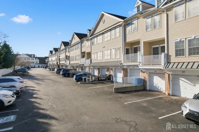 a view of a street with cars