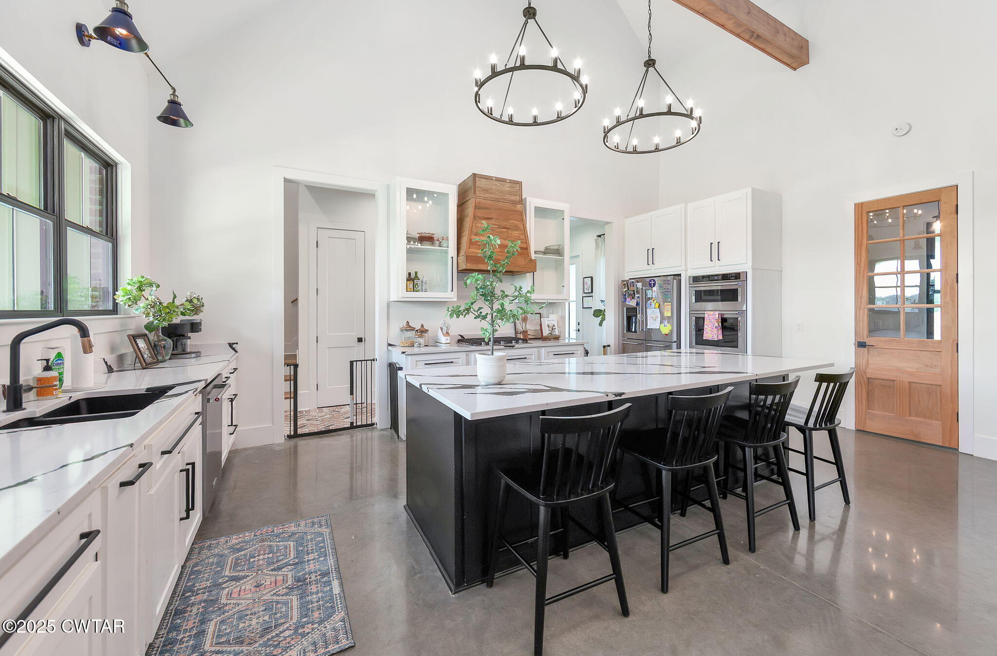 1644 Dr Conyers Road Friendship, TN 38034 - Photo 17 of 43 a large kitchen with a table and chairs in it