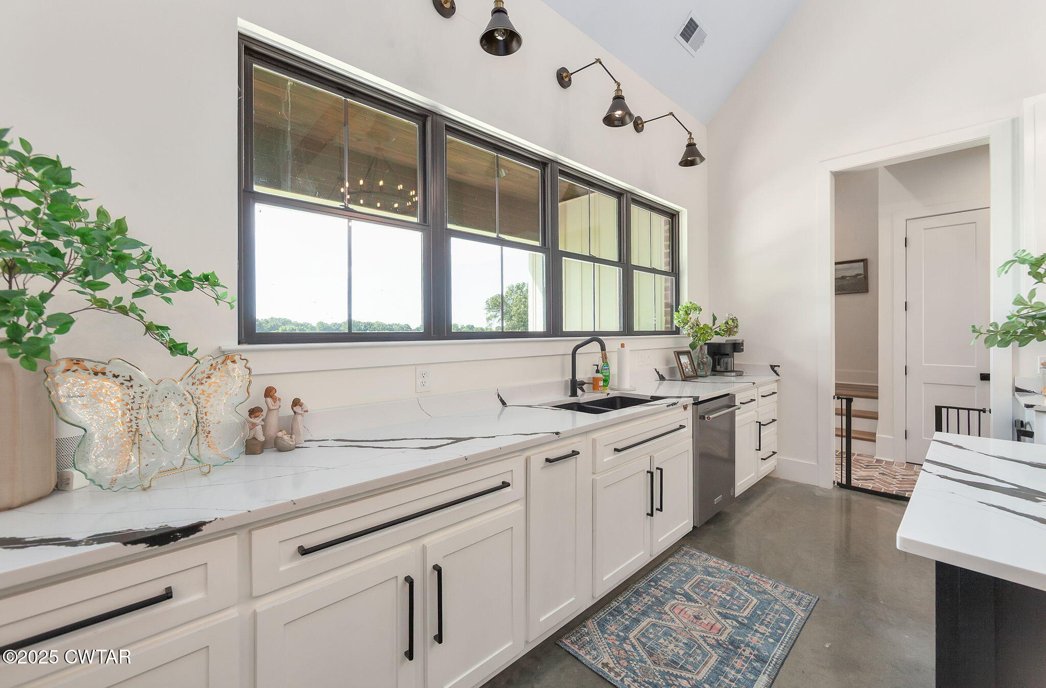 1644 Dr Conyers Road Friendship, TN 38034 - Photo 18 of 43 a kitchen with a sink and cabinets