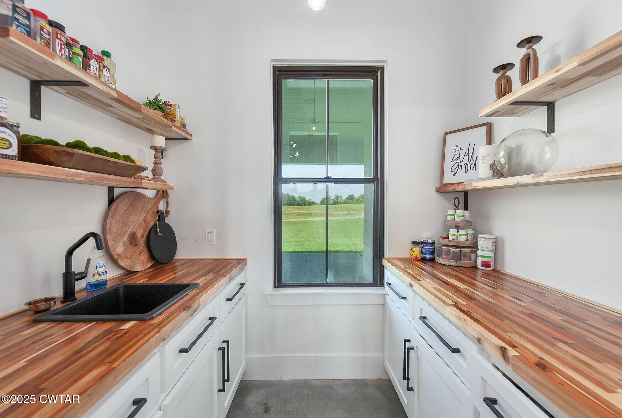 1644 Dr Conyers Road Friendship, TN 38034 - Photo 19 of 43 a kitchen with a sink cabinets and appliances