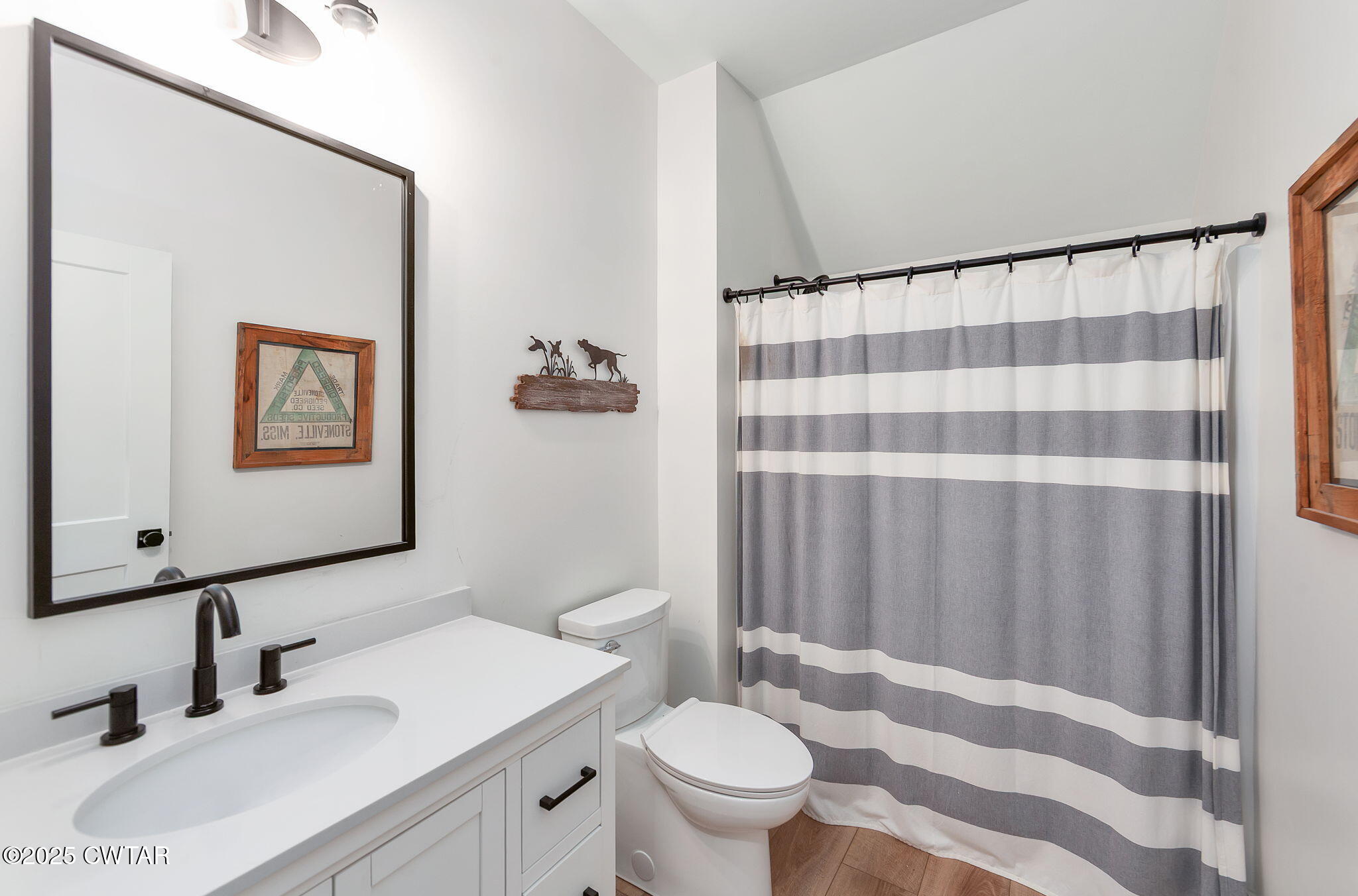 1644 Dr Conyers Road Friendship, TN 38034 - Photo 29 of 43 a bathroom with a sink toilet and shower