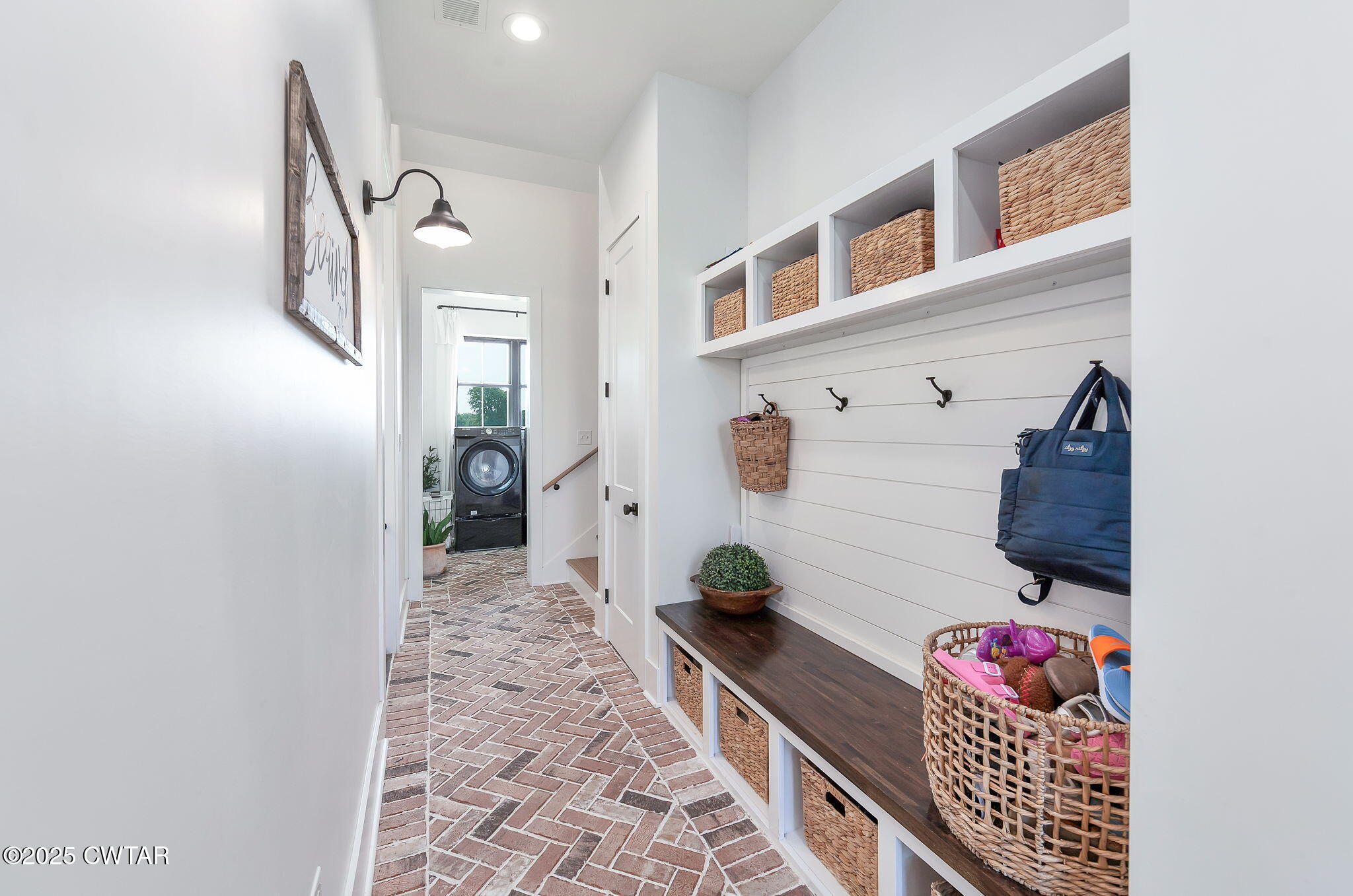 1644 Dr Conyers Road Friendship, TN 38034 - Photo 34 of 43 a hallway with a couch and a potted plant