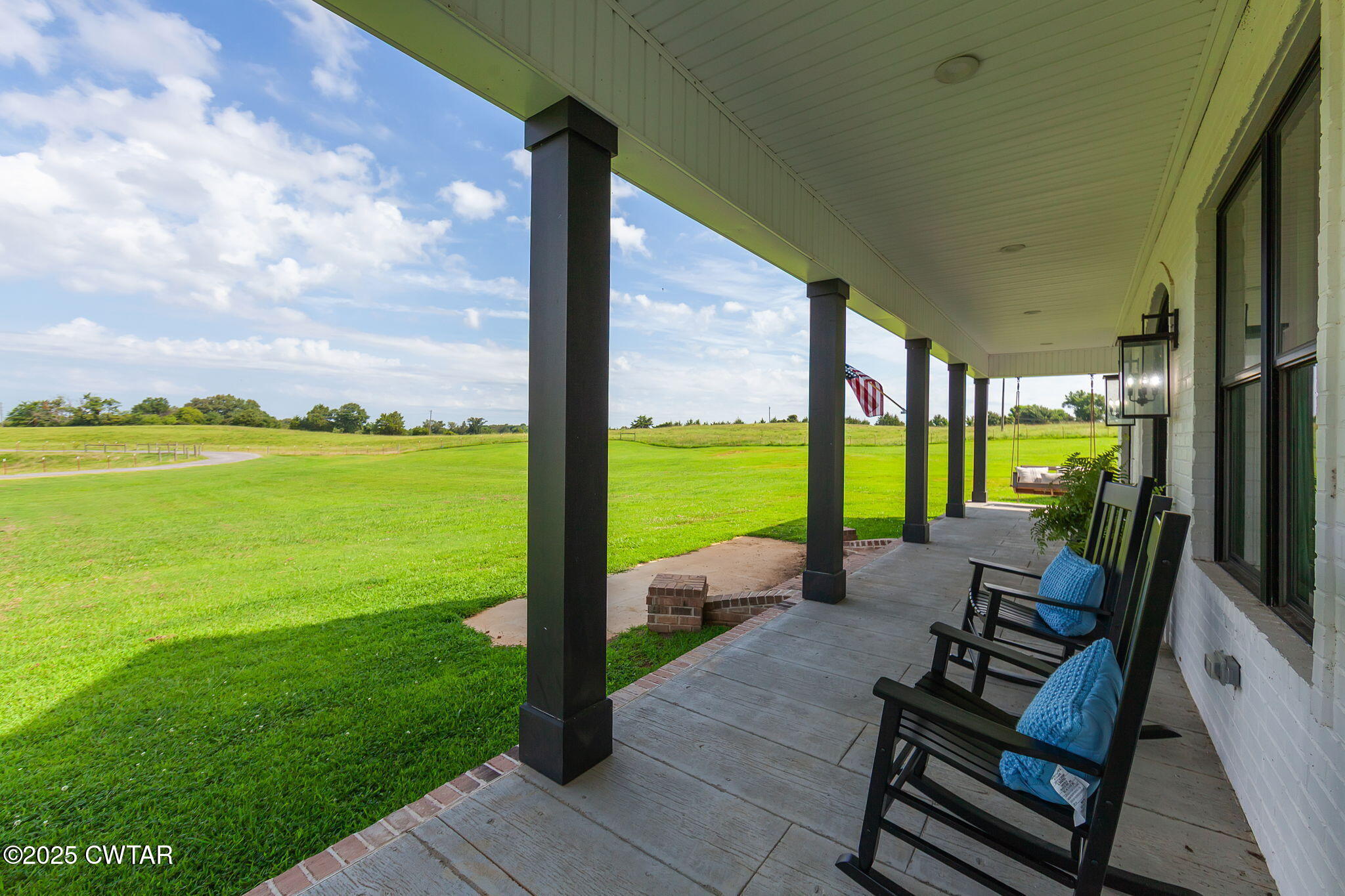 1644 Dr Conyers Road Friendship, TN 38034 - Photo 5 of 43 a view of a chairs and table in the patio next to a yard