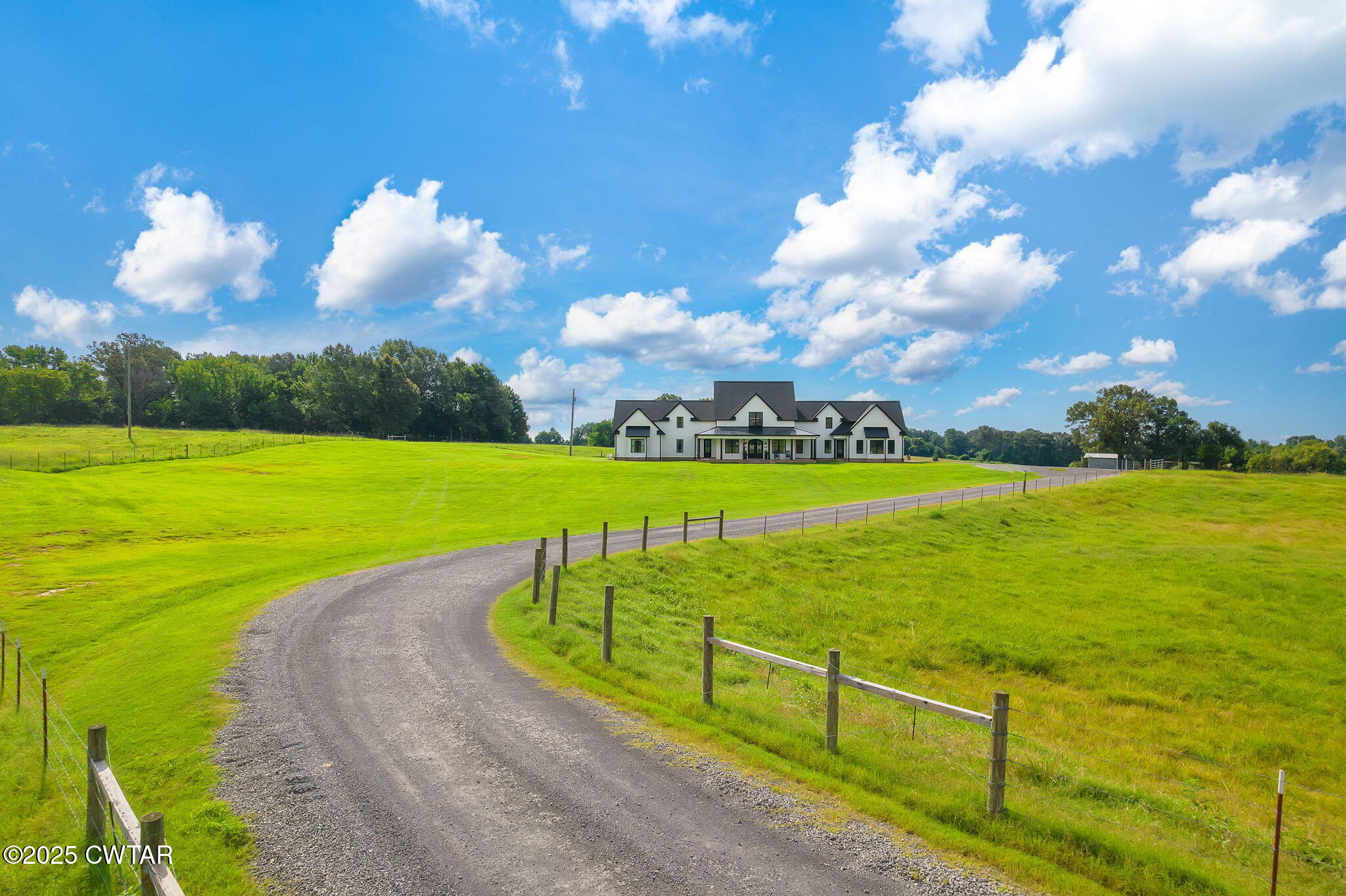 1644 Dr Conyers Road Friendship, TN 38034 - Photo 6 of 43 a view of a golf course with an ocean view