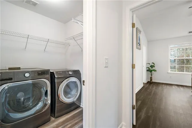 a view of a storage & utility room with washer and dryer