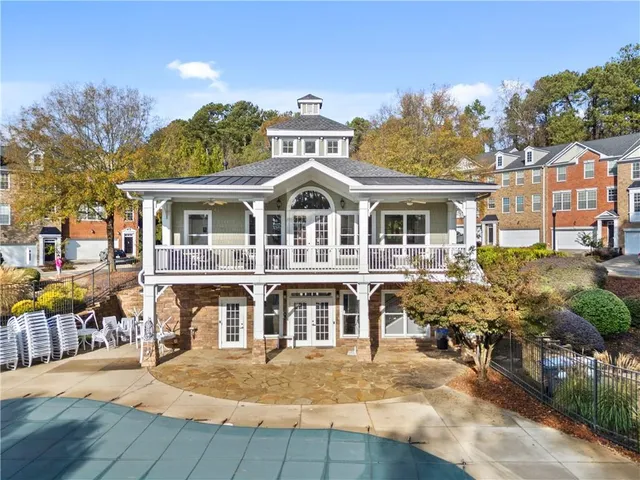 a front view of a house with a porch