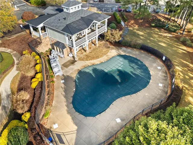 an aerial view of a swimming pool