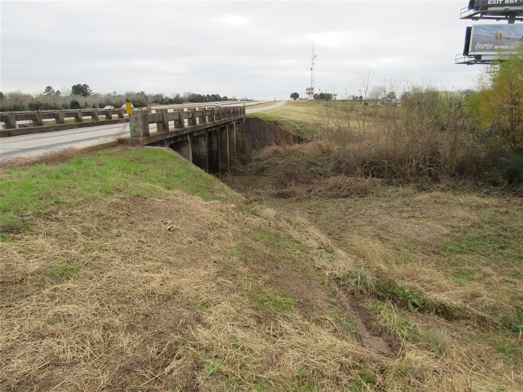 Tbd Tbd I-10 Frontage Road Cat Spring, TX 78933 - Photo 12 of 13 a view of a lake with a yard