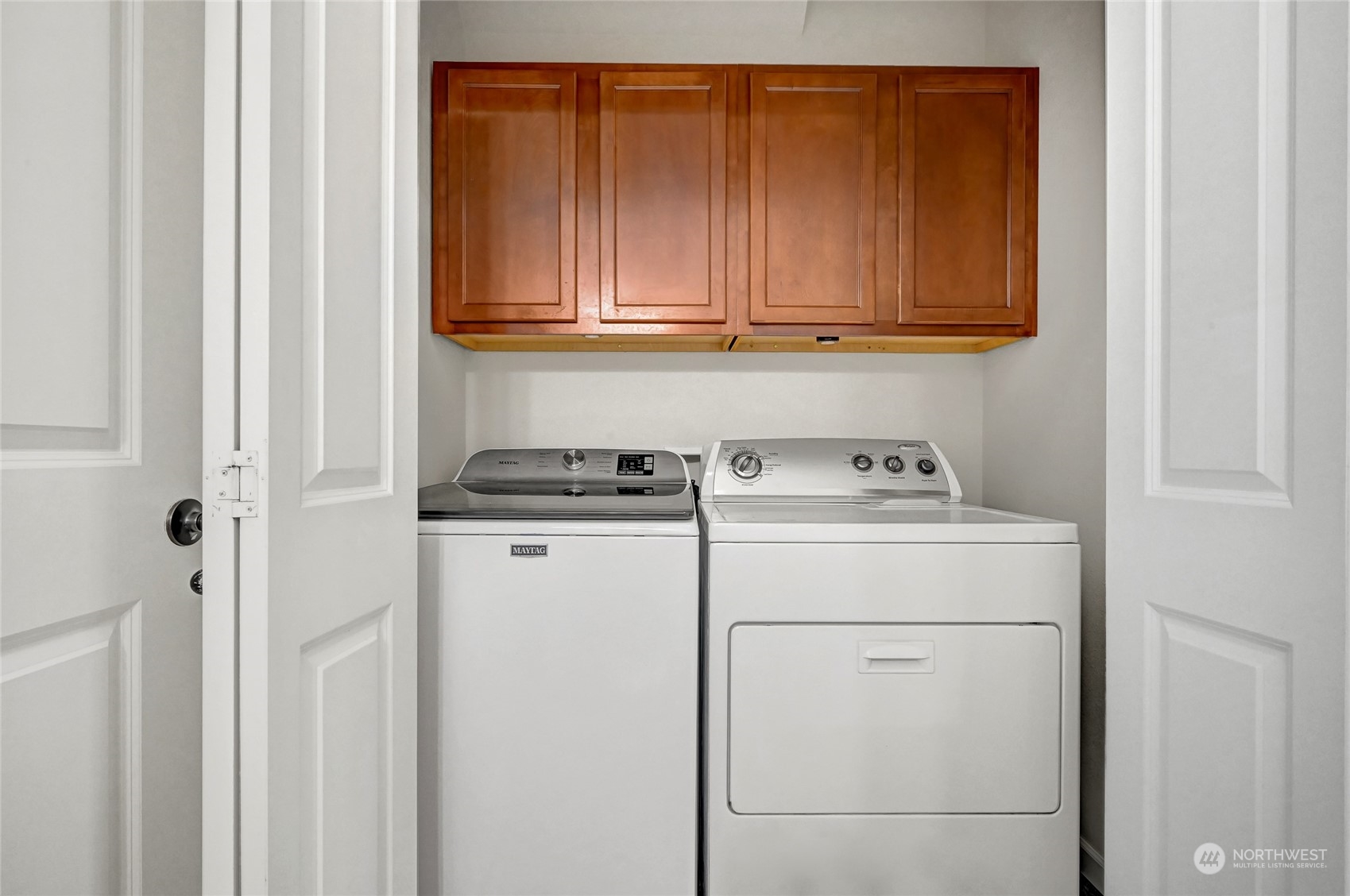 5027 Northeast 5th Place Renton, WA 98059 - Photo 13 of 29 a utility room with dryer and washer