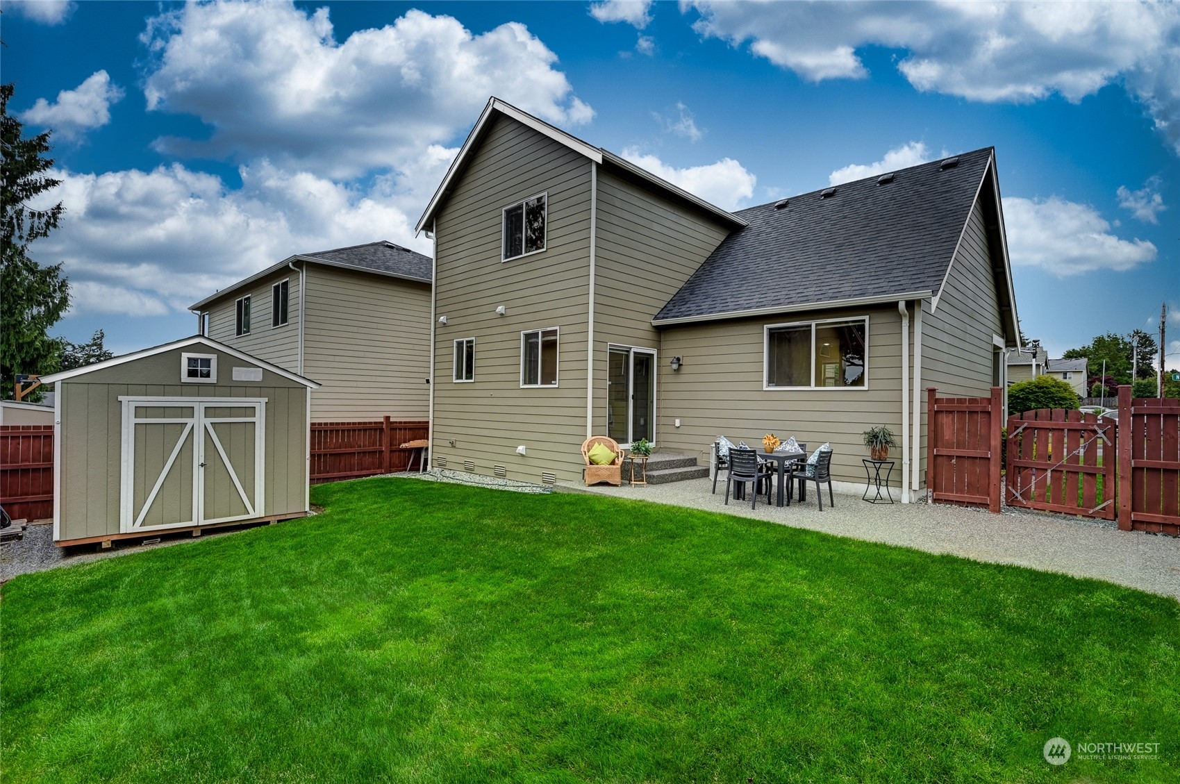 5027 Northeast 5th Place Renton, WA 98059 - Photo 26 of 29 a front view of house with yard and seating area