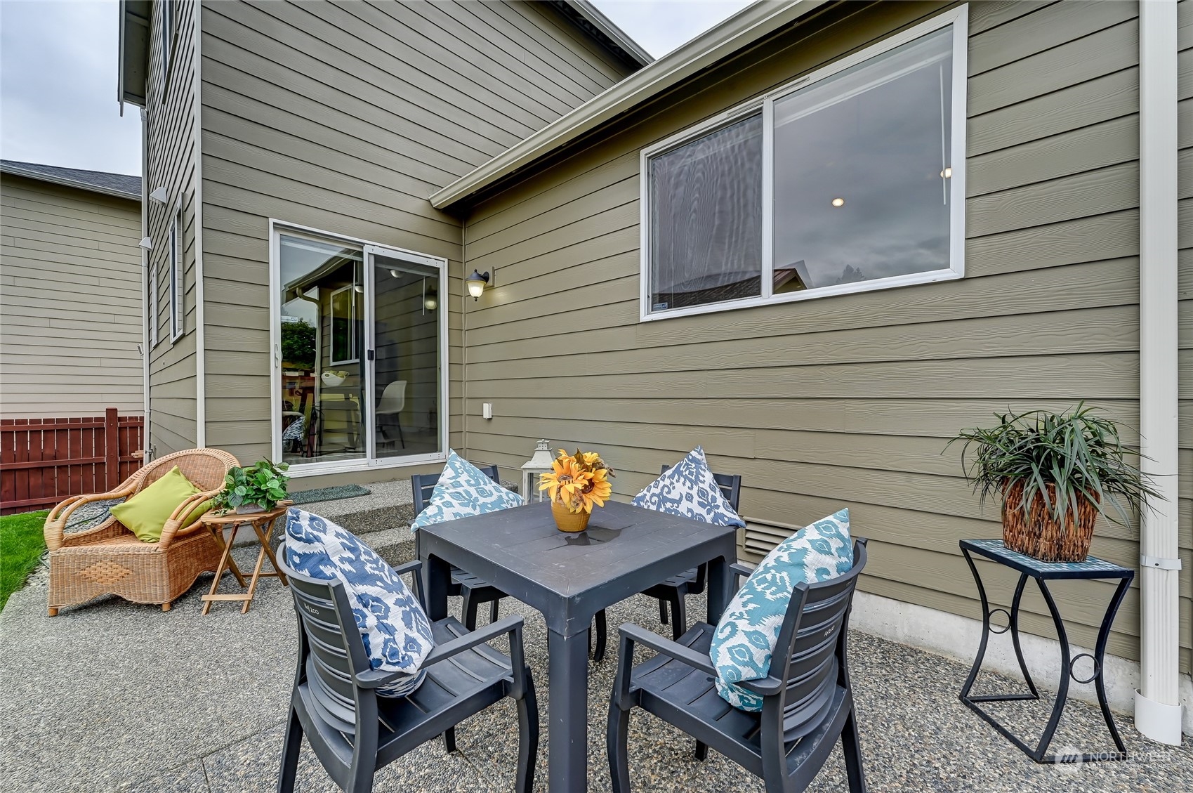 5027 Northeast 5th Place Renton, WA 98059 - Photo 27 of 29 a backyard of a house with table and chairs