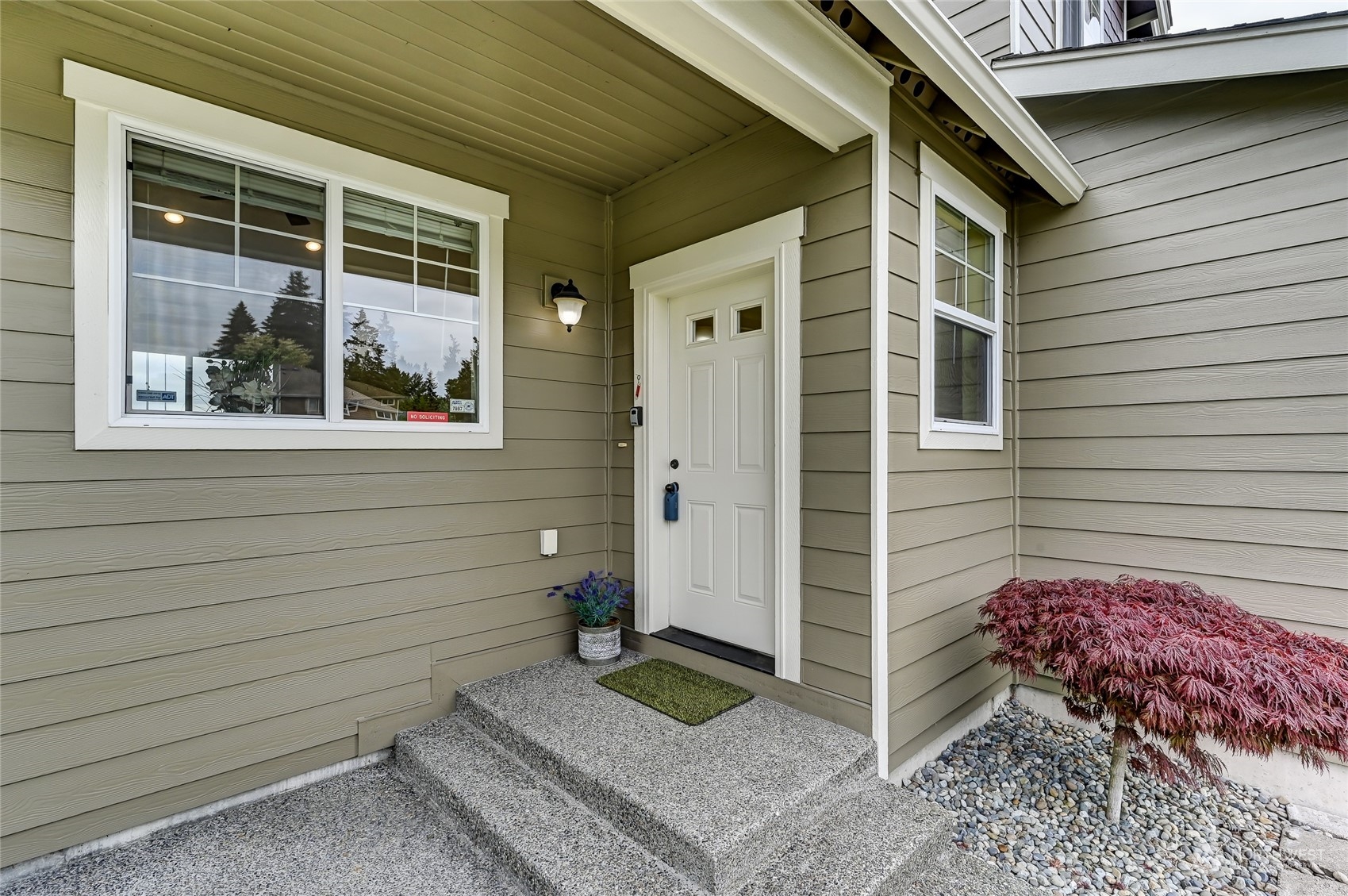 5027 Northeast 5th Place Renton, WA 98059 - Photo 29 of 29 a view of a door and a window