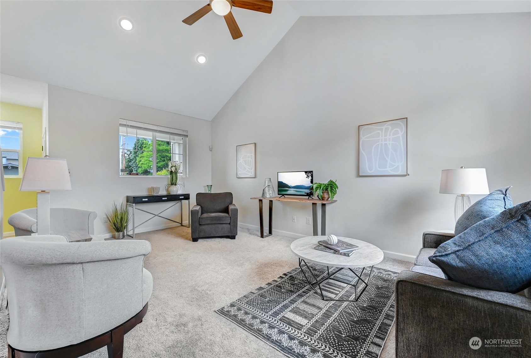 5027 Northeast 5th Place Renton, WA 98059 - Photo 3 of 29 a living room with furniture and a lamp