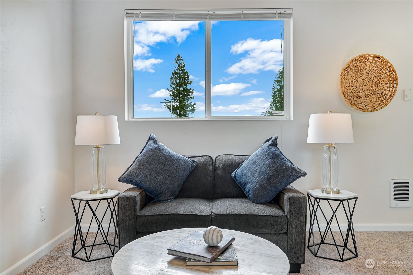 5027 Northeast 5th Place Renton, WA 98059 - Photo 4 of 29 a living room with furniture a lamp and a potted plant