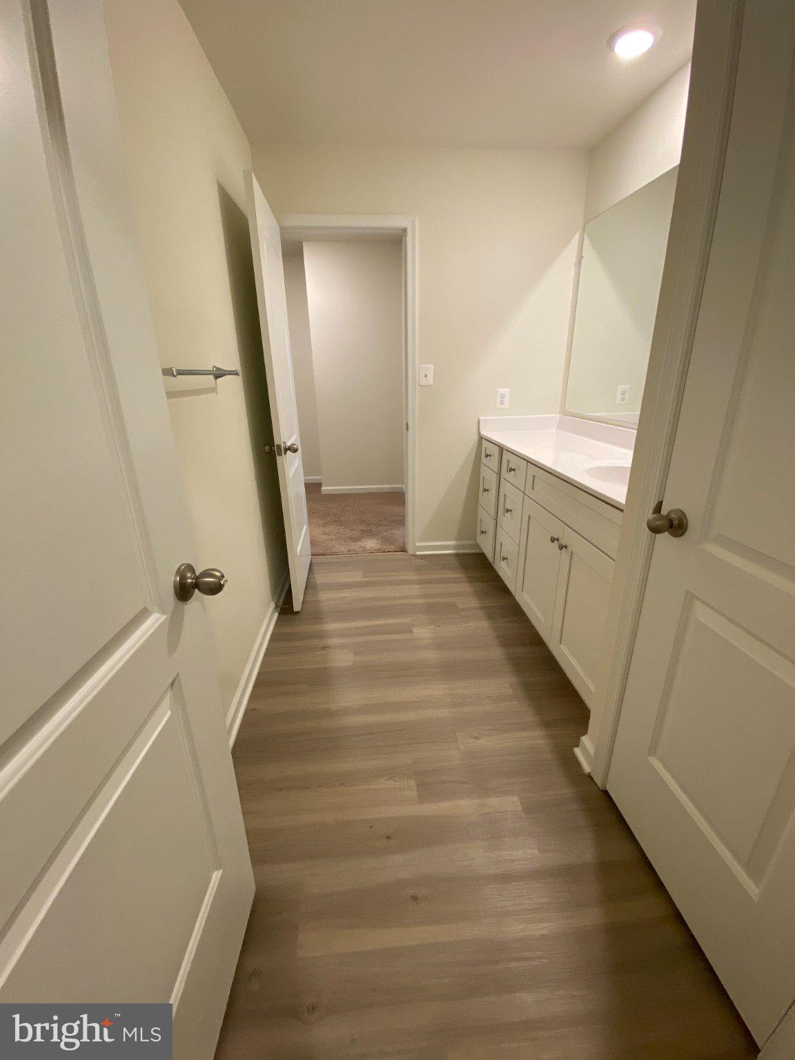 697 Rivanna Run Falling Waters, WV 25419 - Photo 28 of 44 a view of entryway with wooden floor and stairs