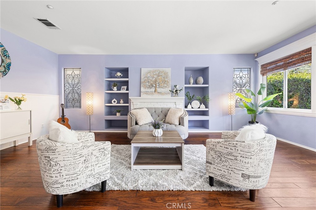 6133 Natalie Road Chino Hills, CA 91709 - Photo 18 of 62 a living room with furniture and wooden floor