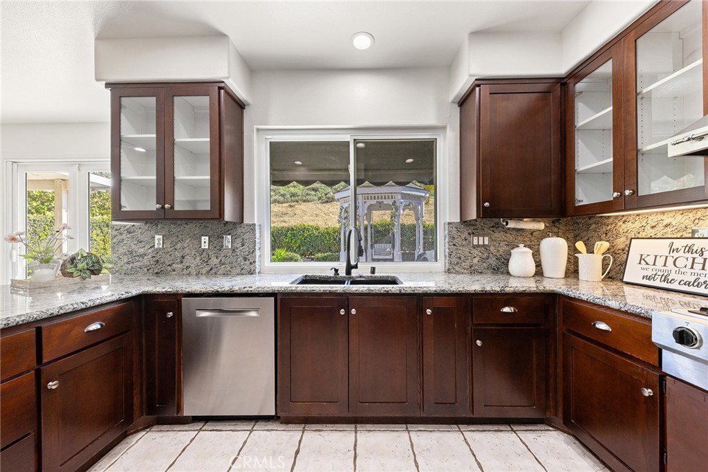 6133 Natalie Road Chino Hills, CA 91709 - Photo 26 of 62 a kitchen with a sink and a window