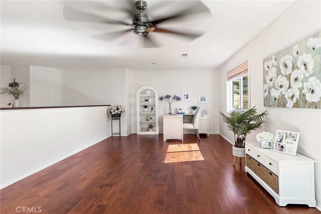6133 Natalie Road Chino Hills, CA 91709 - Photo 33 of 62 a living room with furniture and wooden floor
