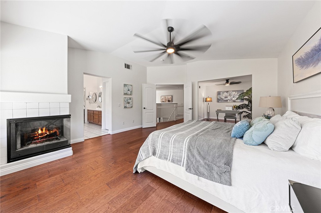 6133 Natalie Road Chino Hills, CA 91709 - Photo 36 of 62 a bedroom with a bed and a fireplace