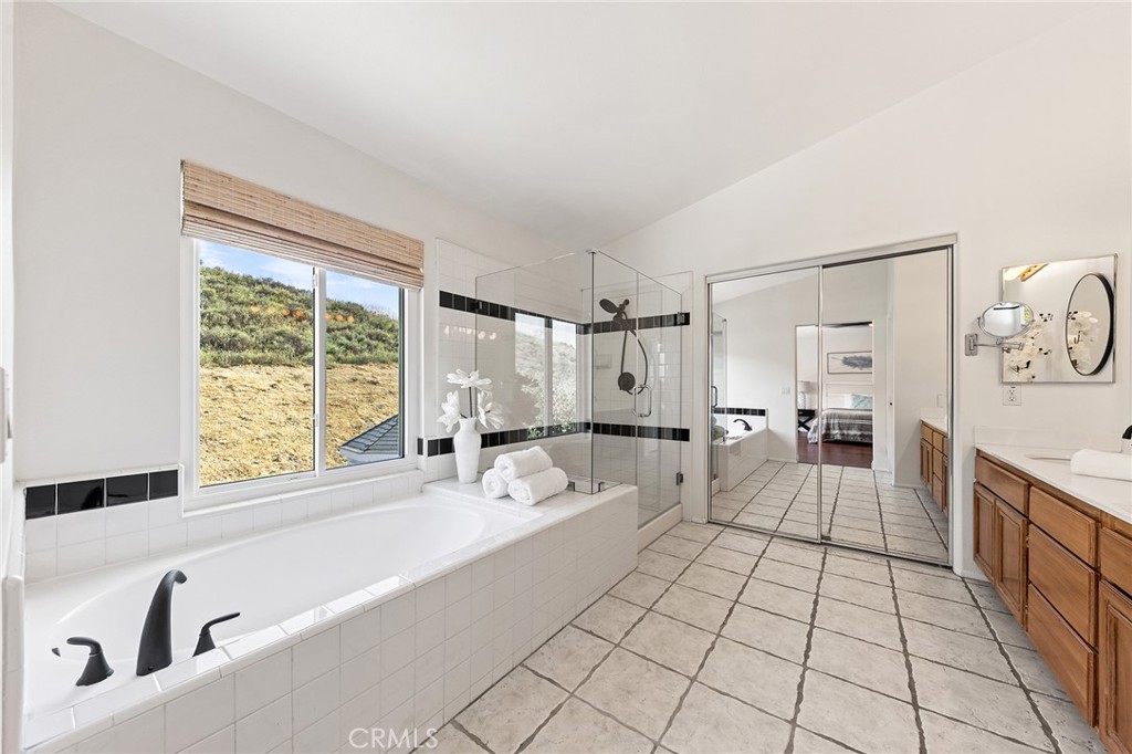 6133 Natalie Road Chino Hills, CA 91709 - Photo 38 of 62 a spacious bathroom with a bathtub and a shower
