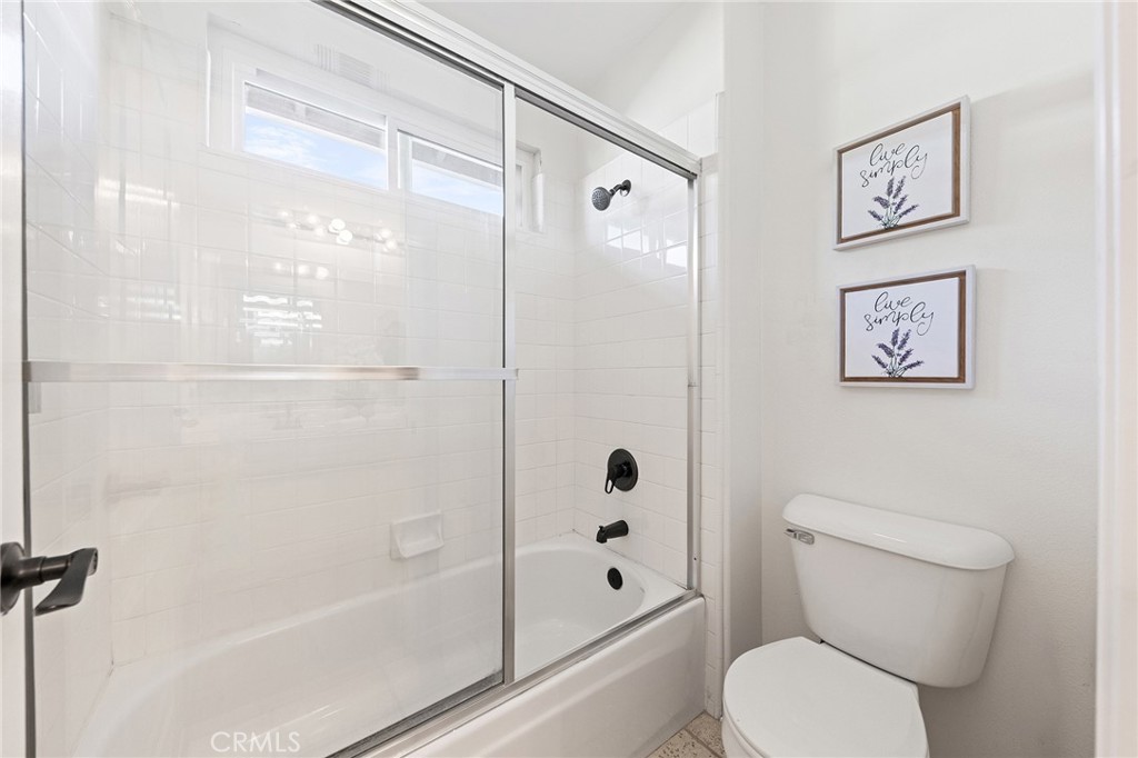 6133 Natalie Road Chino Hills, CA 91709 - Photo 42 of 62 a white toilet sitting next to a bath tub shower