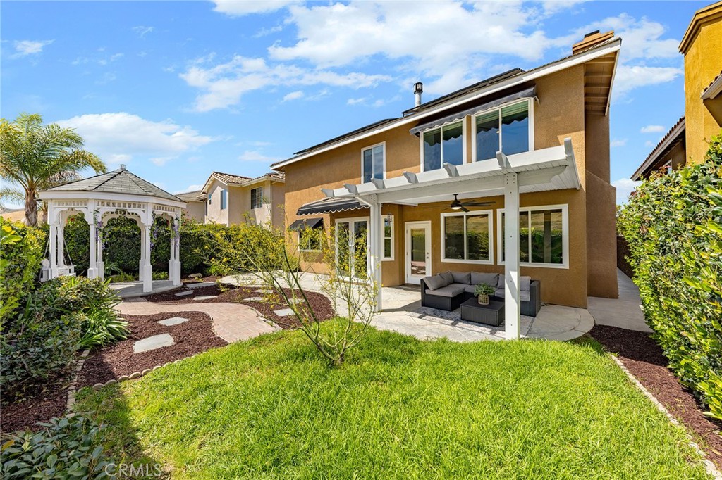 6133 Natalie Road Chino Hills, CA 91709 - Photo 48 of 62 a view of a house with sitting area and garden