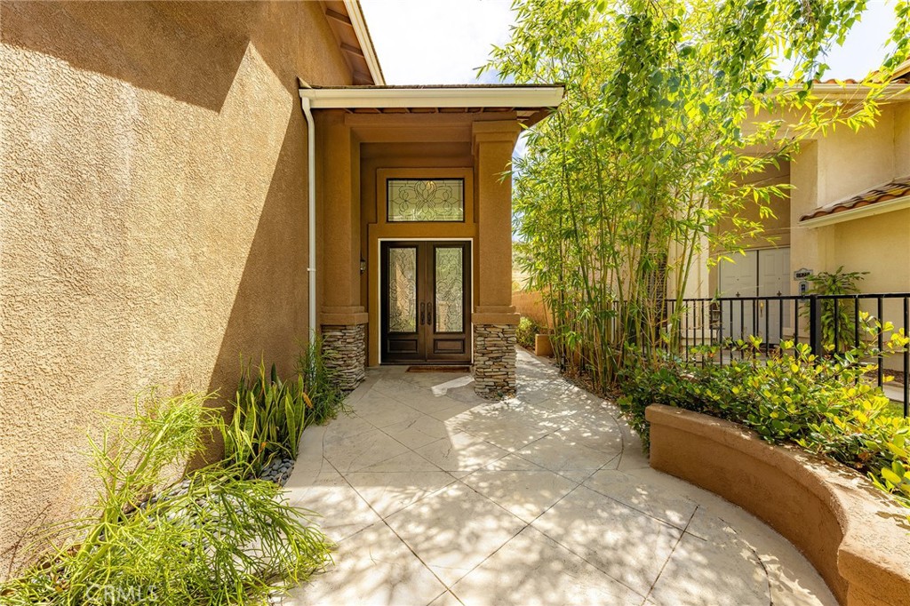 6133 Natalie Road Chino Hills, CA 91709 - Photo 8 of 62 a front view of a house with a yard
