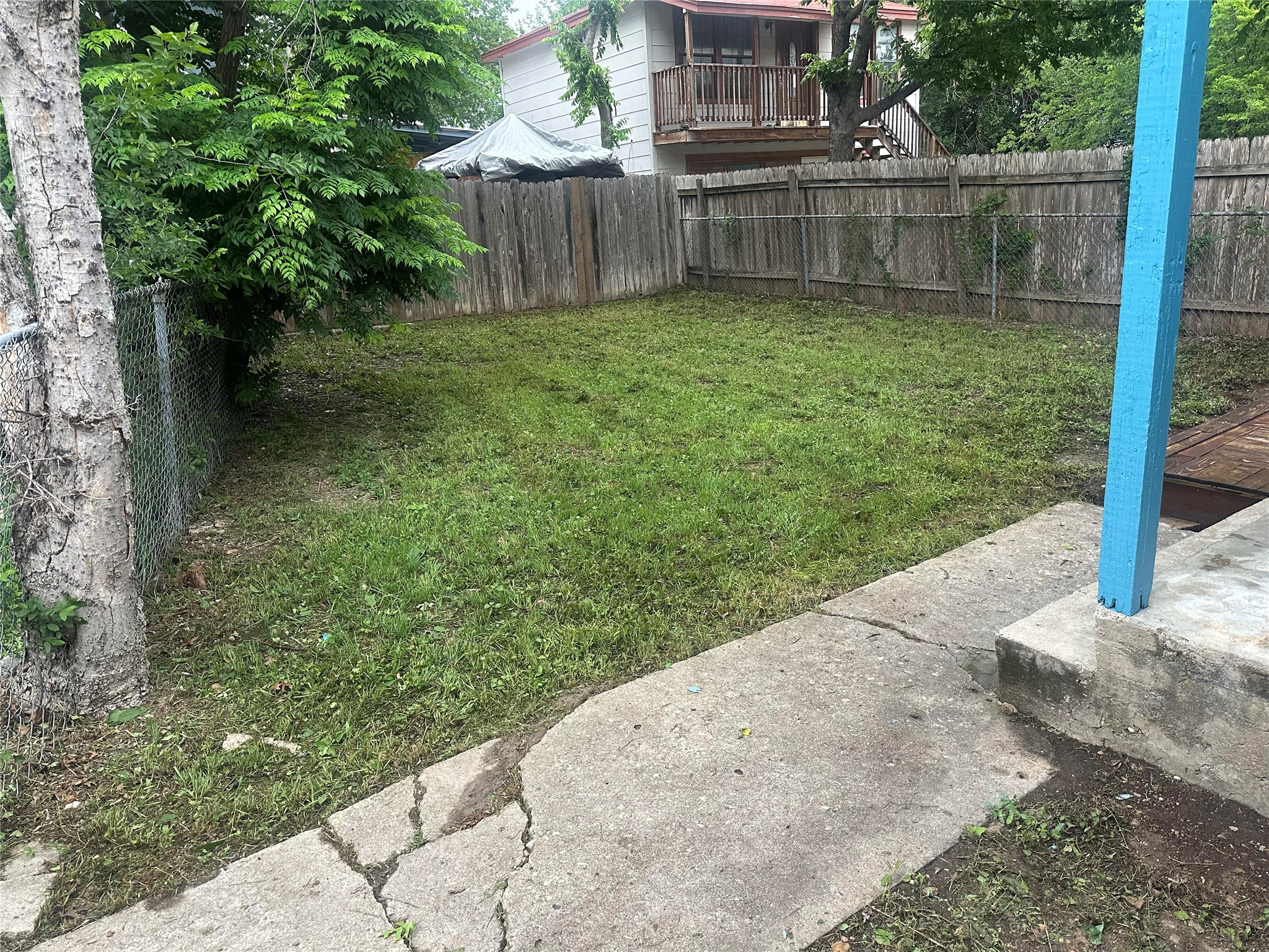 504 West St Johns Avenue, Unit A Austin, TX 78752 - Photo 17 of 17 a view of a backyard with a small cabin