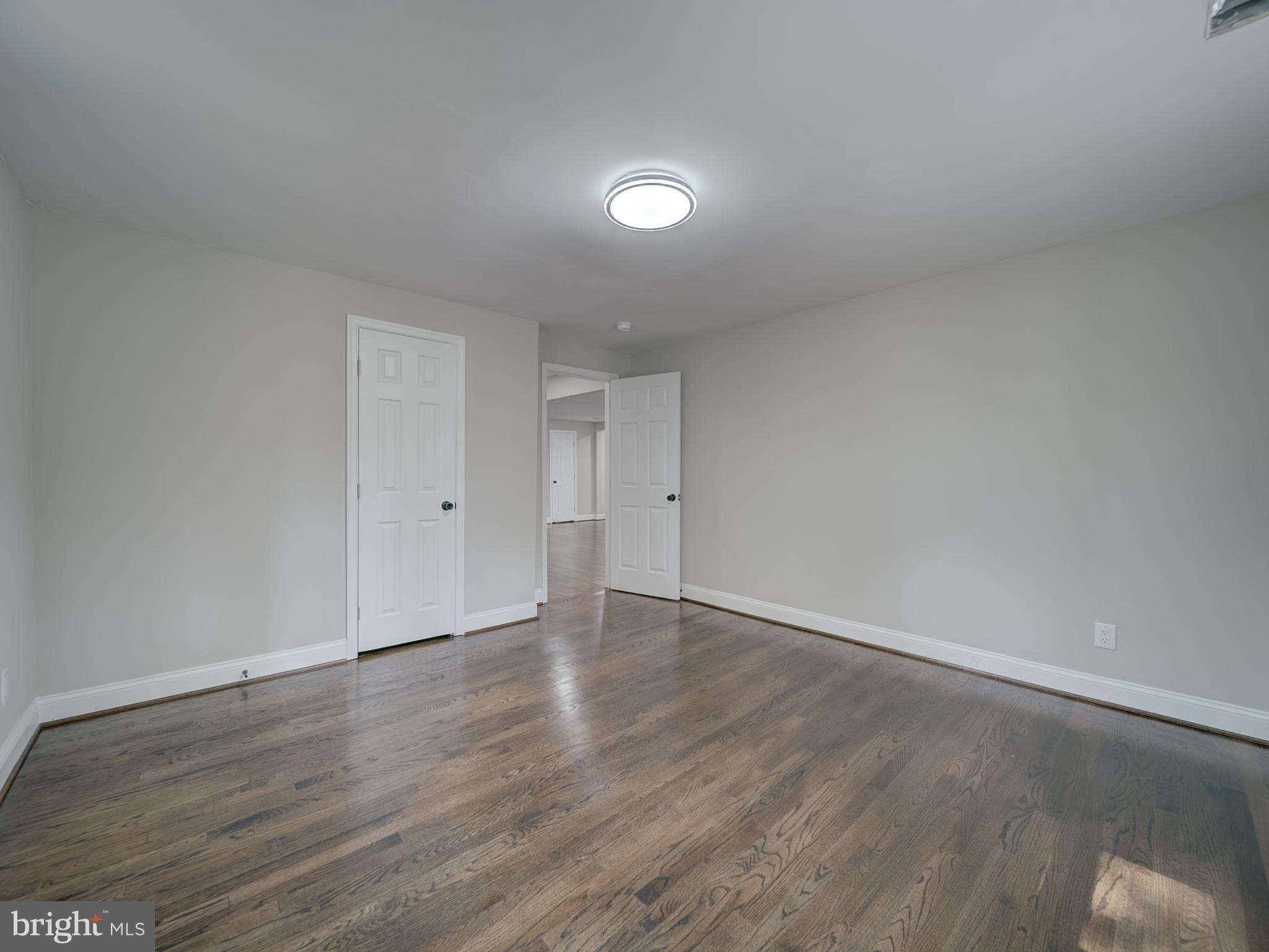 401 Bryan Point Road Accokeek, MD 20607 - Photo 31 of 48 a view of an empty room with wooden floor