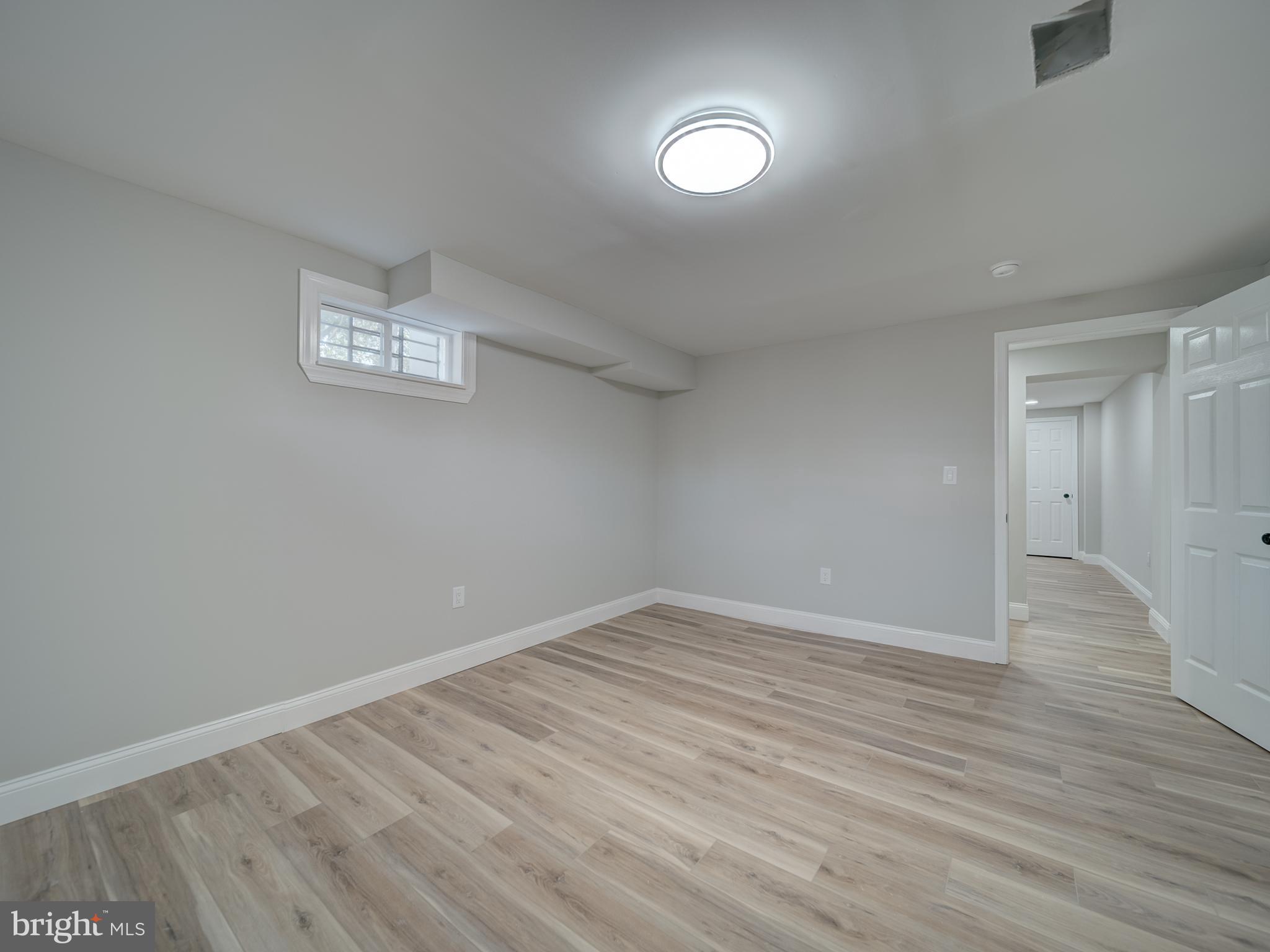 401 Bryan Point Road Accokeek, MD 20607 - Photo 41 of 48 wooden floor in an empty room