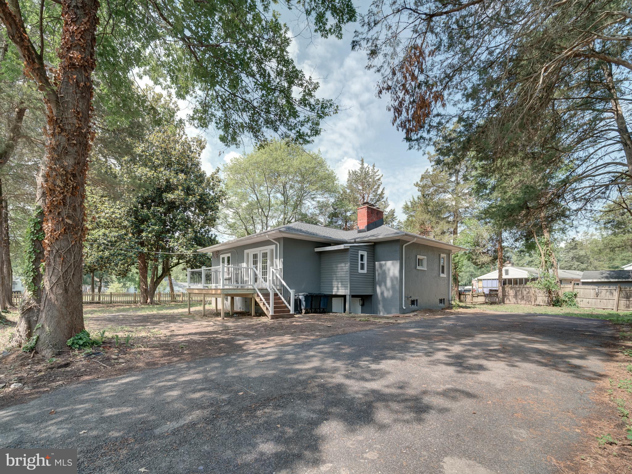 401 Bryan Point Road Accokeek, MD 20607 - Photo 46 of 48 a front view of a house with a yard