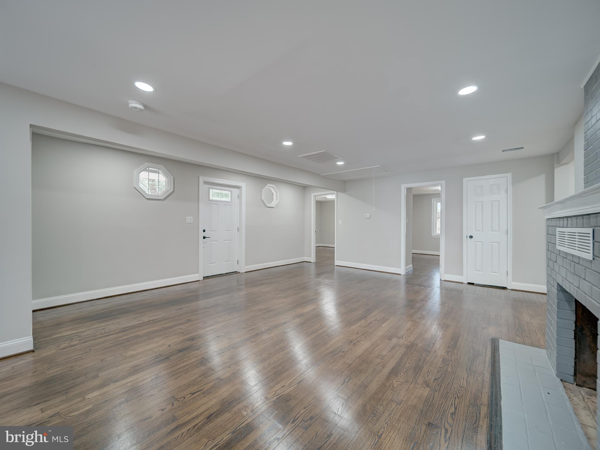 401 Bryan Point Road Accokeek, MD 20607 - Photo 7 of 48 a view of an empty room with wooden floor