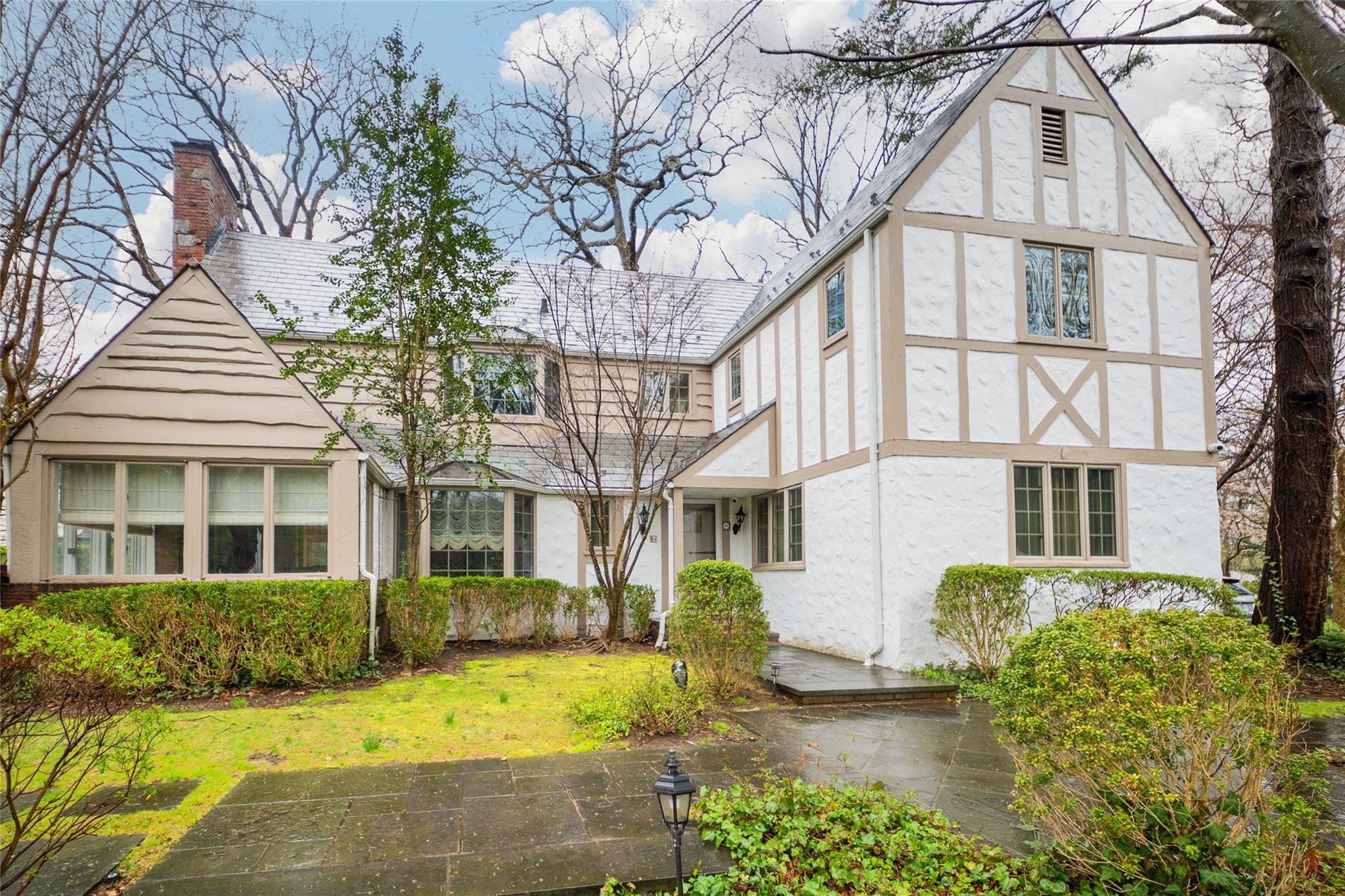 front view of a house with a yard