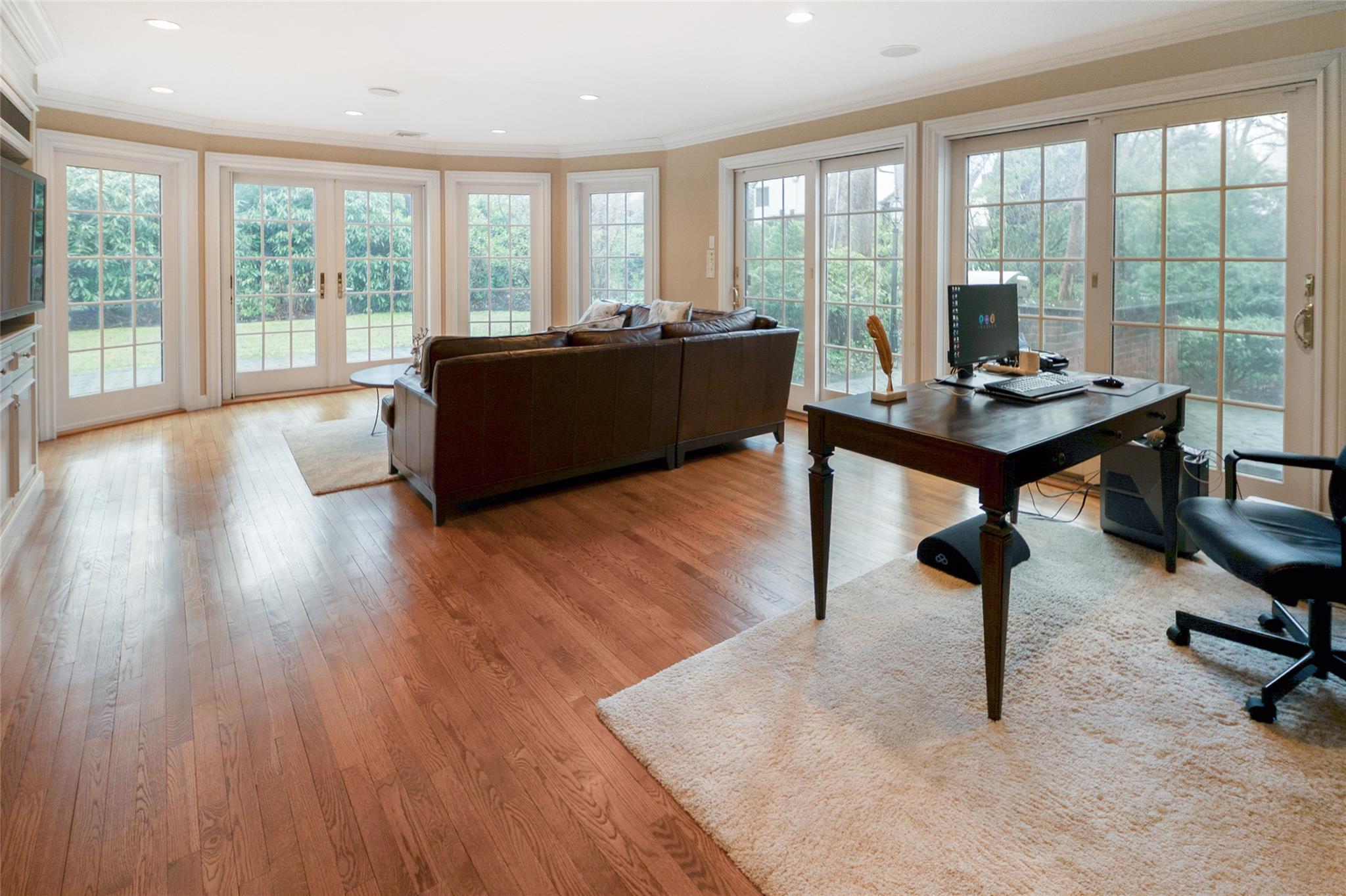 20 Sussex Road Great Neck, NY 11020 - Photo 5 of 27 a living room with furniture and a large window