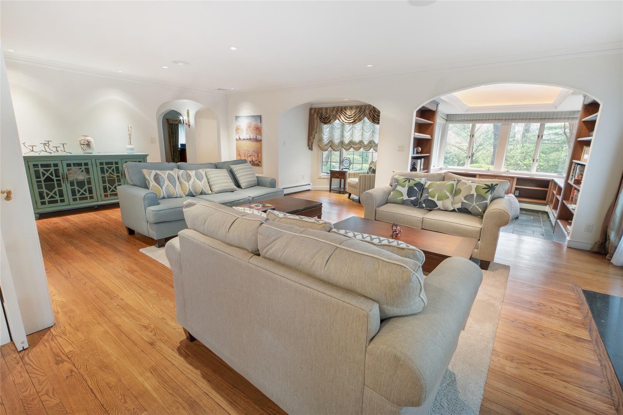 20 Sussex Road Great Neck, NY 11020 - Photo 6 of 27 a living room with furniture and a wooden floor