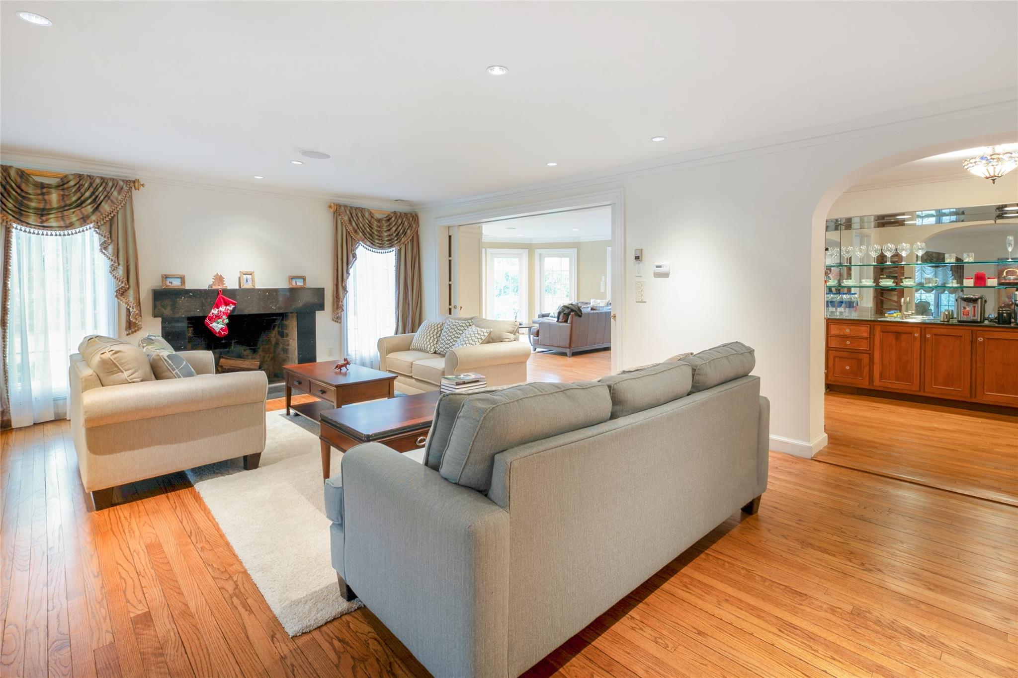 20 Sussex Road Great Neck, NY 11020 - Photo 10 of 27 a living room with furniture and a wooden floor