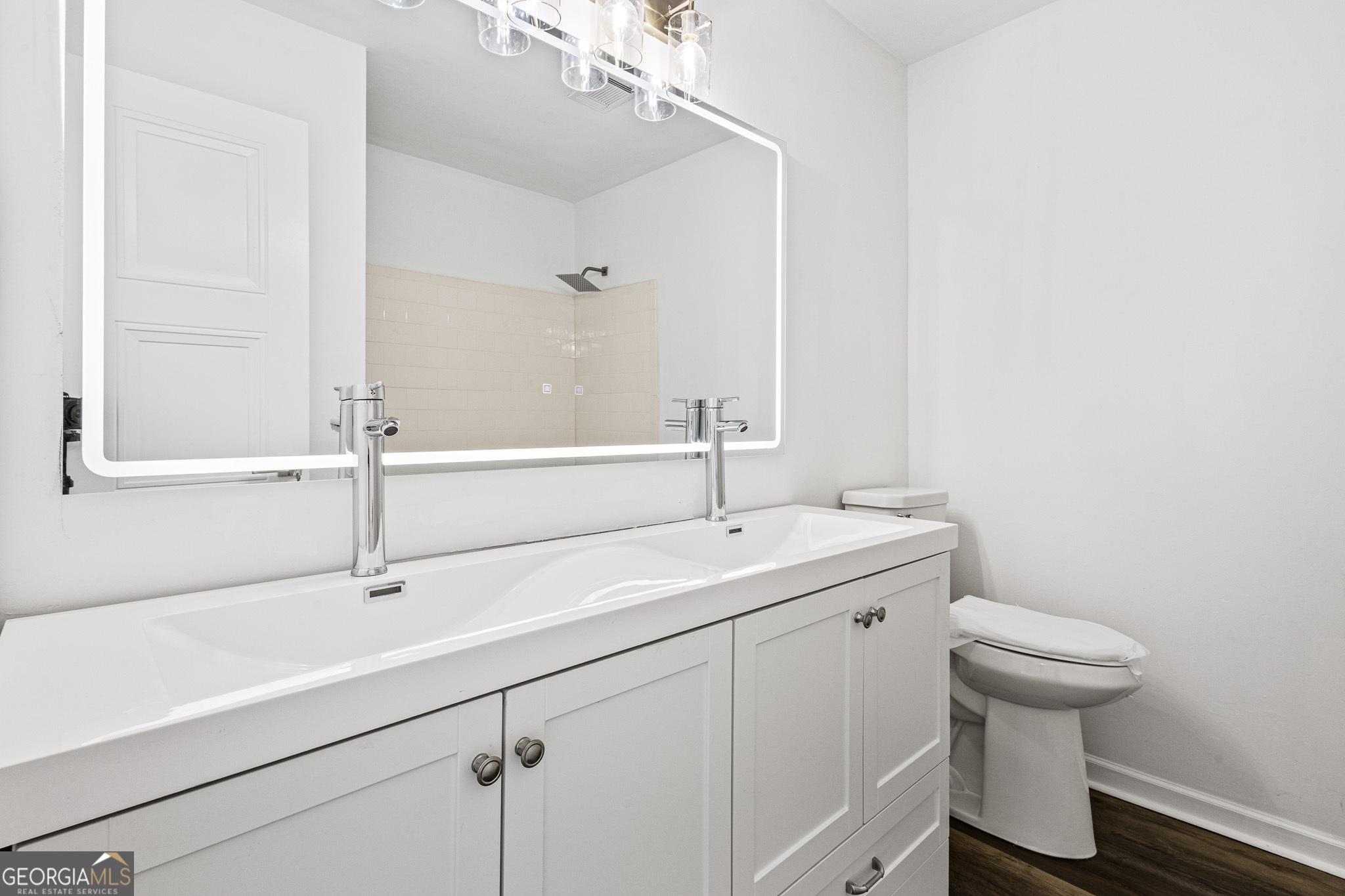 4701 Flat Shoals Road, Unit 47A Union City, GA 30291 - Photo 16 of 29 a bathroom with a sink and a toilet