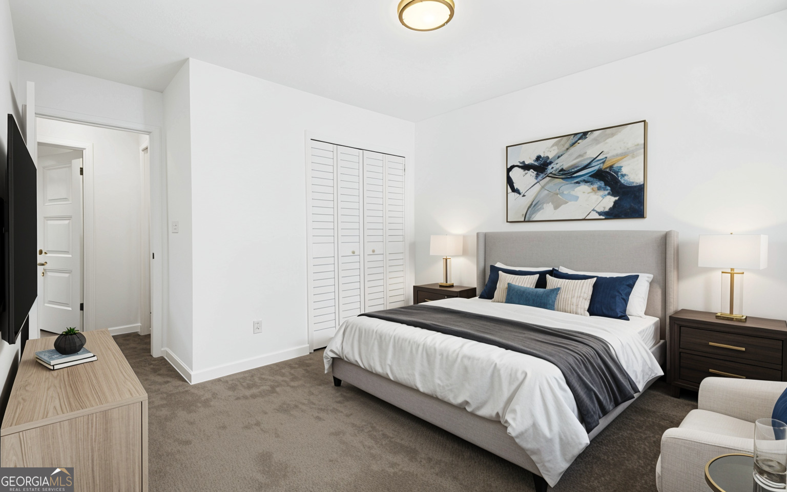 4701 Flat Shoals Road, Unit 47A Union City, GA 30291 - Photo 18 of 29 a bedroom with a bed and a couch