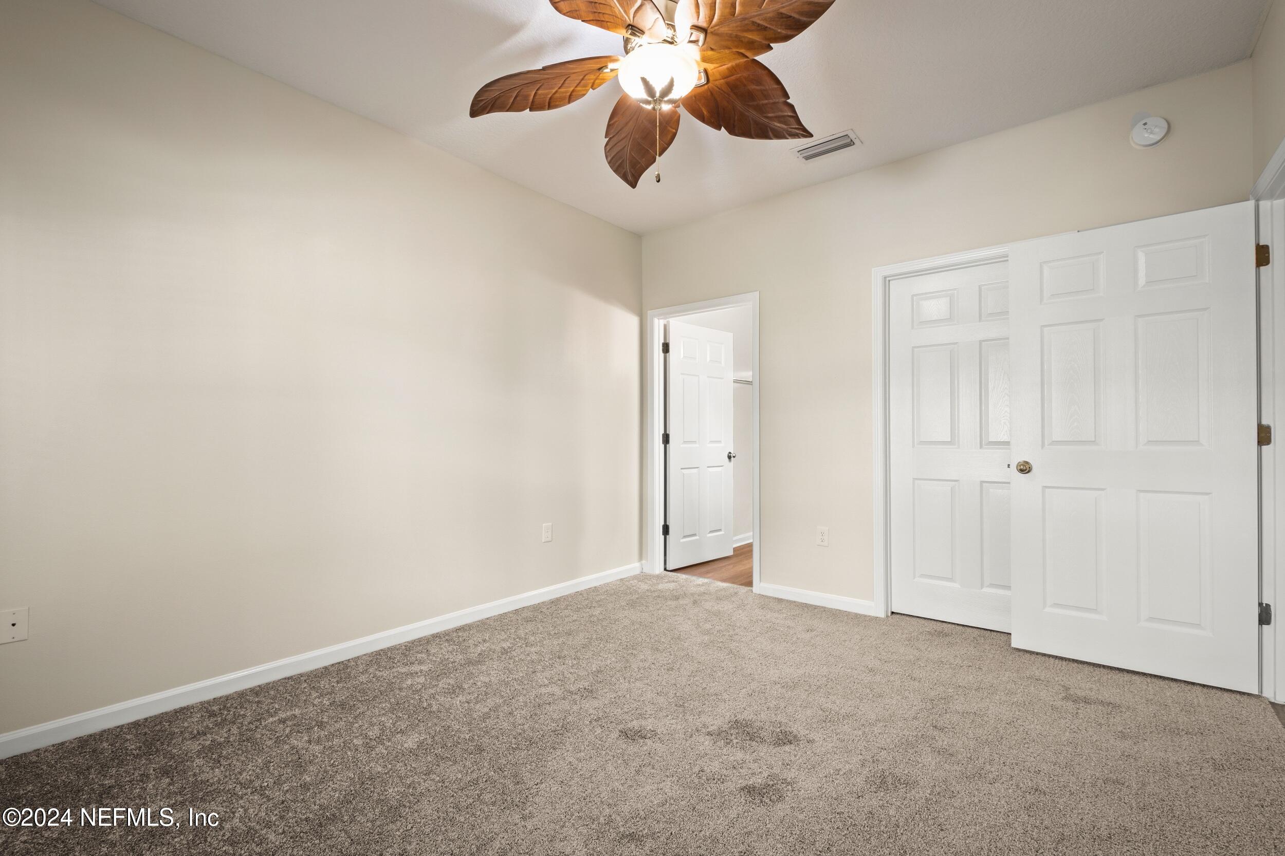 8218 Green Parrot Road, Unit 108 Jacksonville, FL 32256 - Photo 19 of 29 Primary Bedroom
