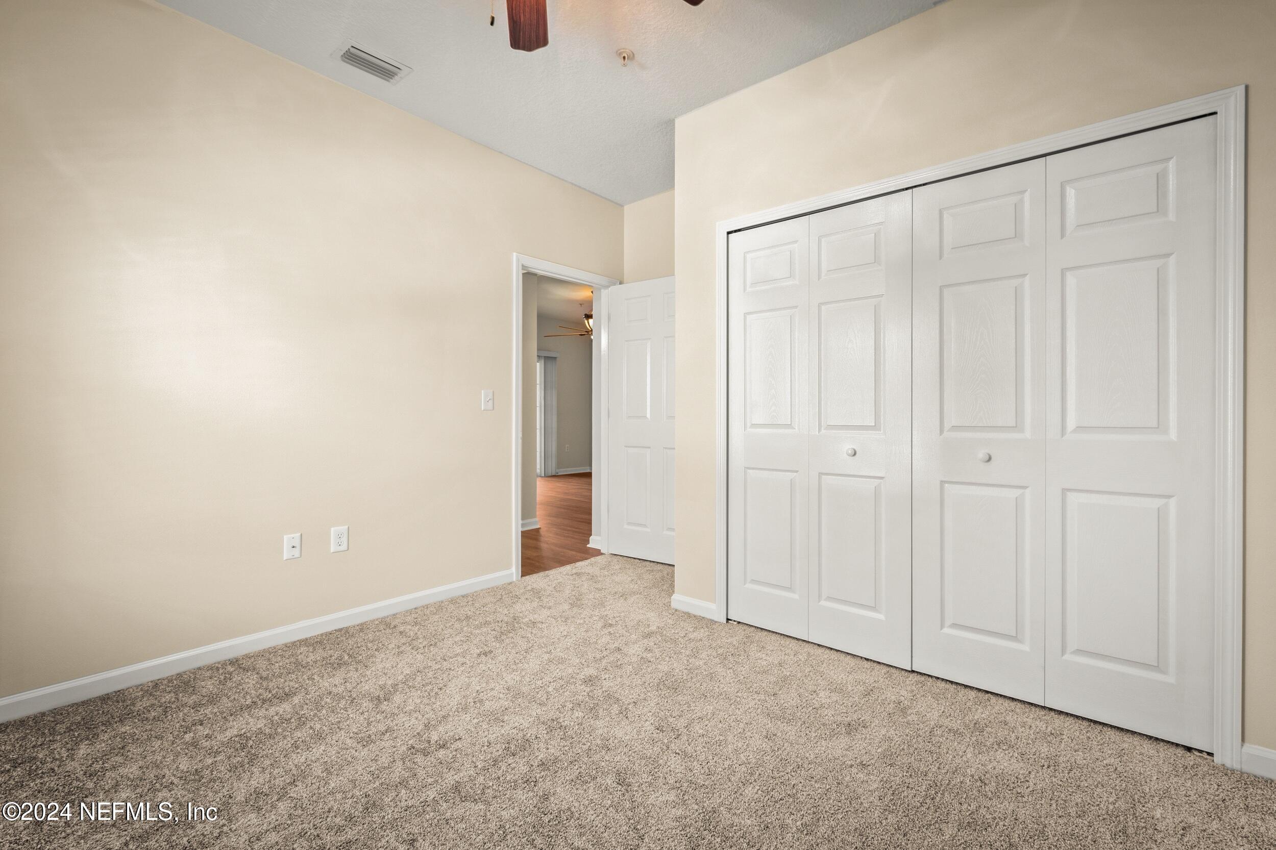8218 Green Parrot Road, Unit 108 Jacksonville, FL 32256 - Photo 23 of 29 Bedroom 2
