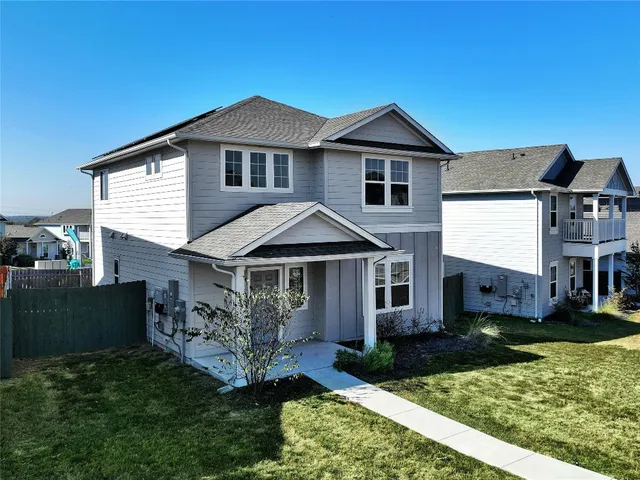 a view of a house with swimming pool