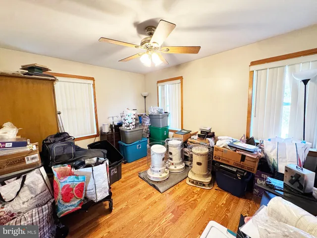 a living room with furniture fireplace and a flat screen tv