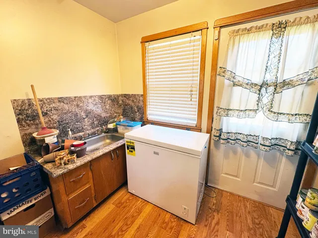 a room with furniture and a book shelf
