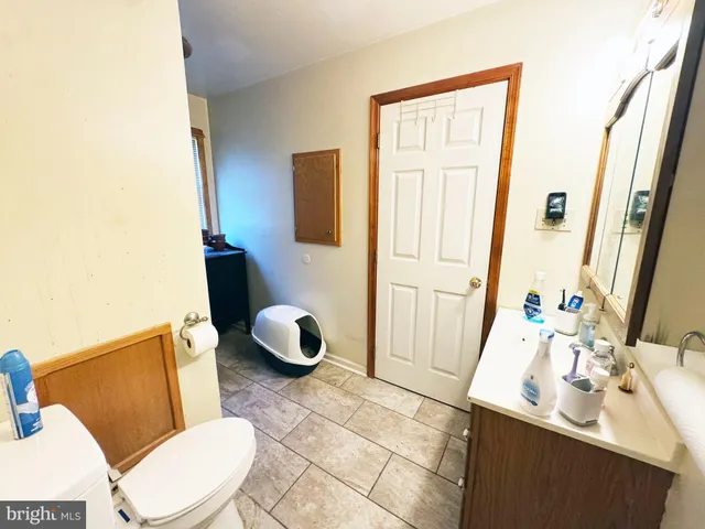 a view of a hallway with front door