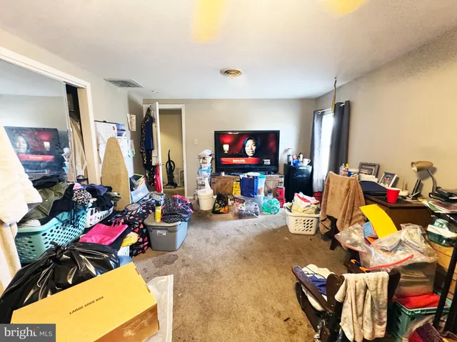 a view of a livingroom with furniture and a living room