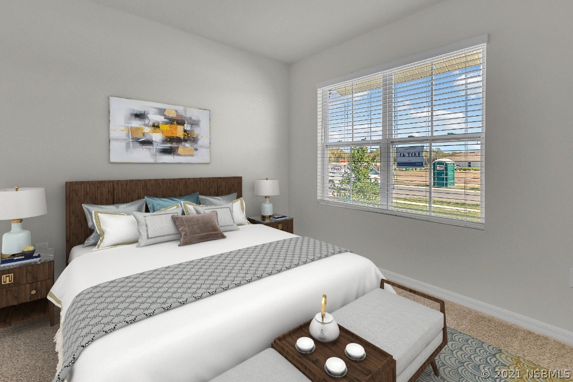 101 Old Mill Pond Road Palm Harbor, FL 34683 - Photo 13 of 20 a bedroom with a bed and a window