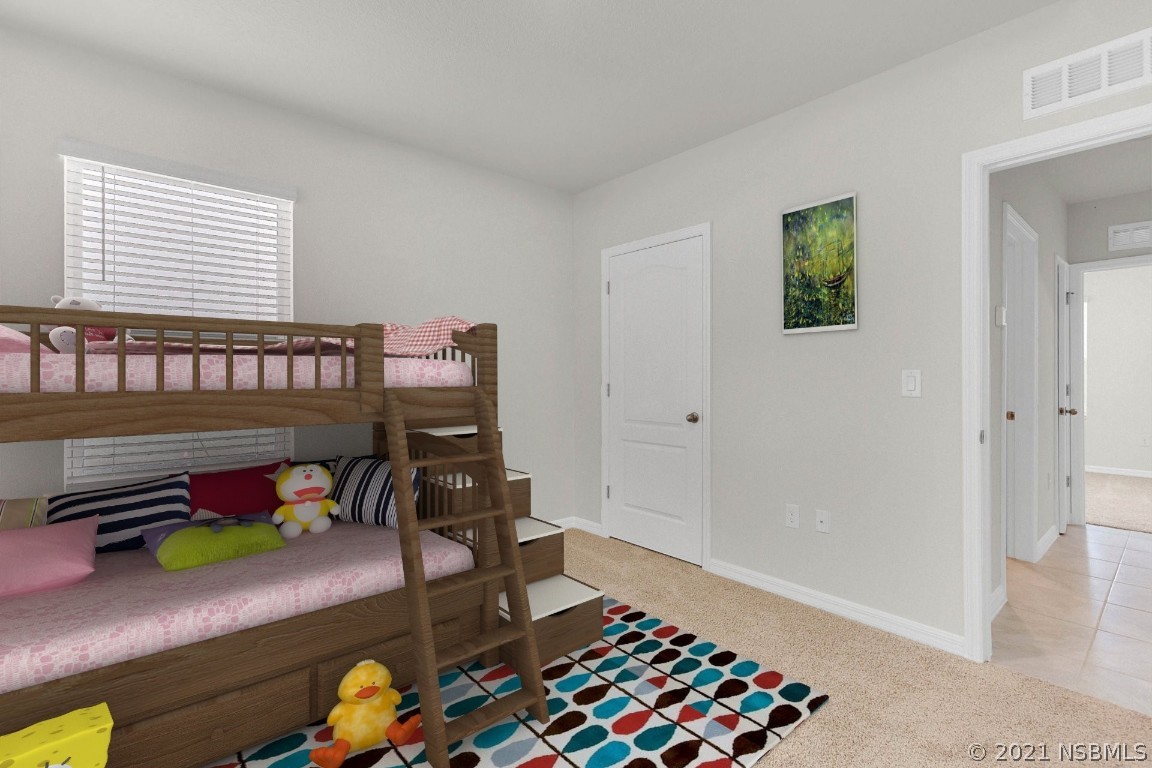 101 Old Mill Pond Road Palm Harbor, FL 34683 - Photo 18 of 20 a bedroom with bunk bed and a window