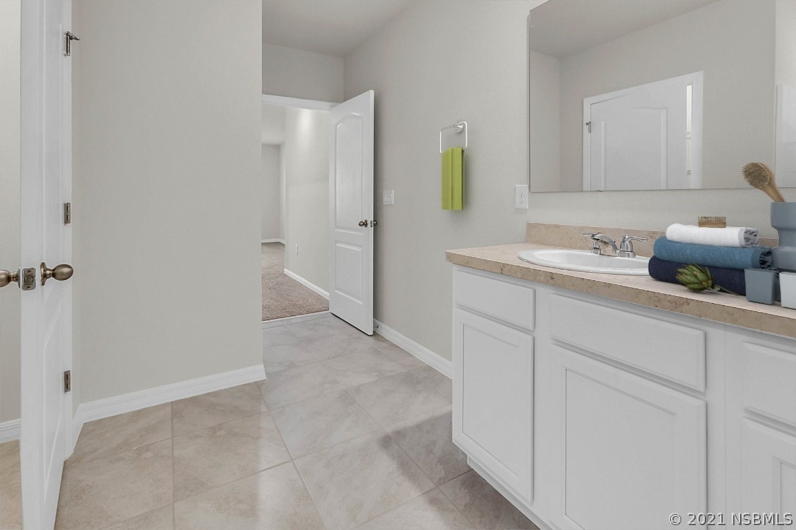 101 Old Mill Pond Road Palm Harbor, FL 34683 - Photo 10 of 20 a kitchen with a sink and cabinets