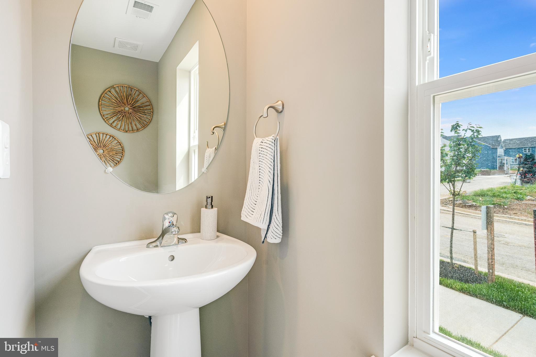 336 Watercourse Drive Ranson, WV 25438 - Photo 19 of 20 a bathroom with a sink and a mirror