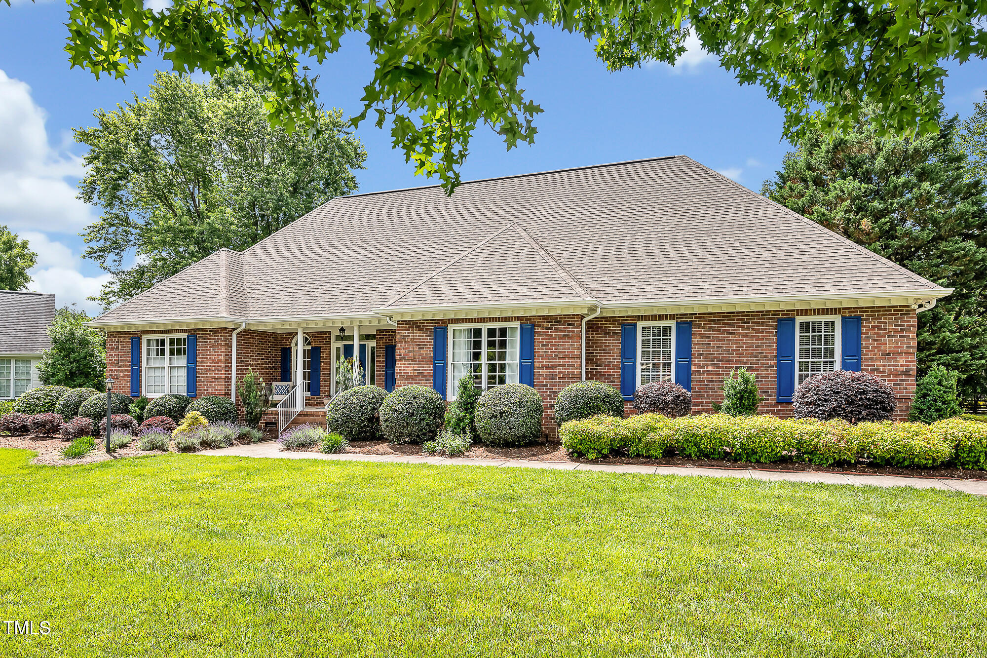 14 Marigold Place Durham, NC 27705 - Photo 1 of 32 a front view of a house with garden